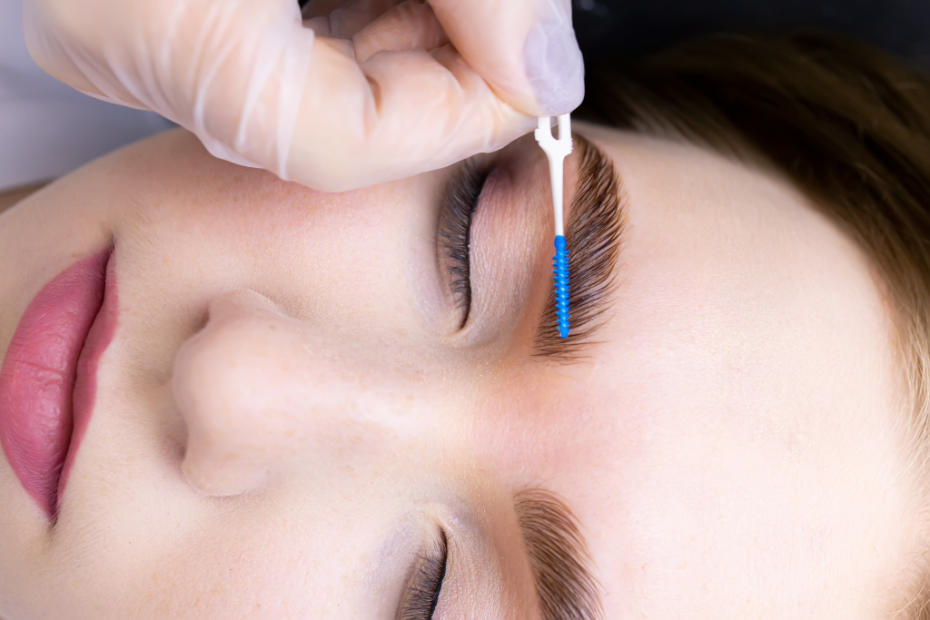 beautiful woman having eyebrows done at my purity spa