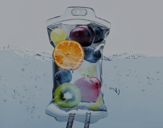 Colorful fruits and IV drips representing wellness and hydration therapy